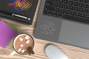 Laptop Adhesive sticker mockup with desk elements