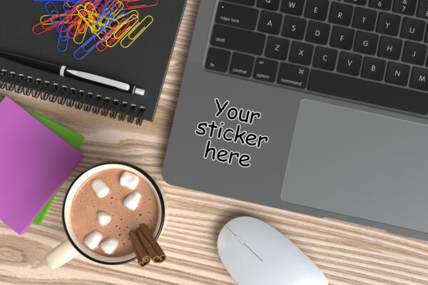 Laptop Adhesive sticker mockup with desk elements